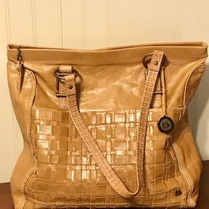 The Sak camel tan woven leather shoulder bag